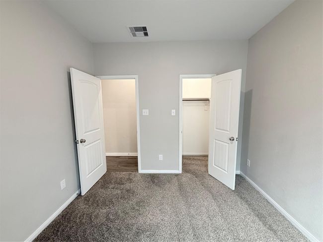 14501 SUGAR PINES DR - Secondary Bedroom - three bedrooms and full bath at the front of the home | Image 40