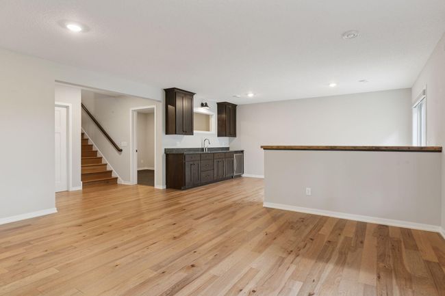 Fabulous flexible lower level space provides the perfect space for family room plus game area | Image 37