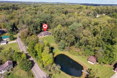 Aerial view featuring a water view | Image 2