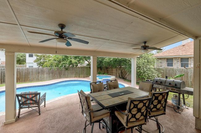 Great covered patio for entertaining by the pool! | Image 27