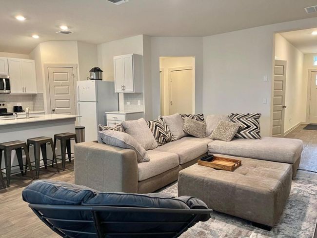 Living area featuring light wood-type flooring and recessed lighting | Image 10