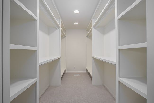 Primary bedroom walk-in closet - so much space for so many shoes. | Image 39