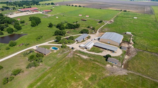Aerial overview of property's location with rural landscape, a pastoral area, and a nearby body of water | Image 29