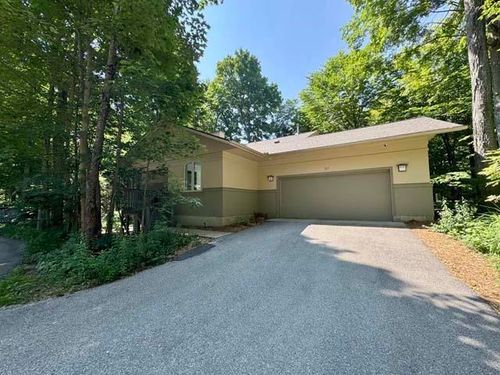 12055 S Woodwinds Cir, Traverse City, MI, 49684-7725 | Card Image