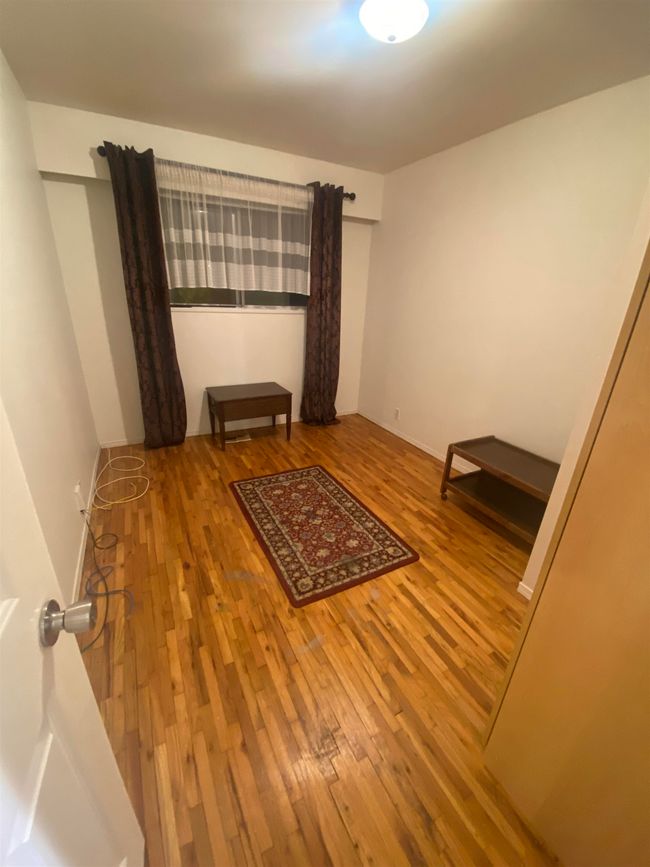 Unfurnished room featuring hardwood / wood-style floors | Image 13