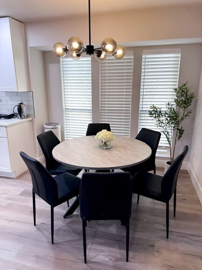 Dining room with light hardwood / wood-style flooring | Image 6