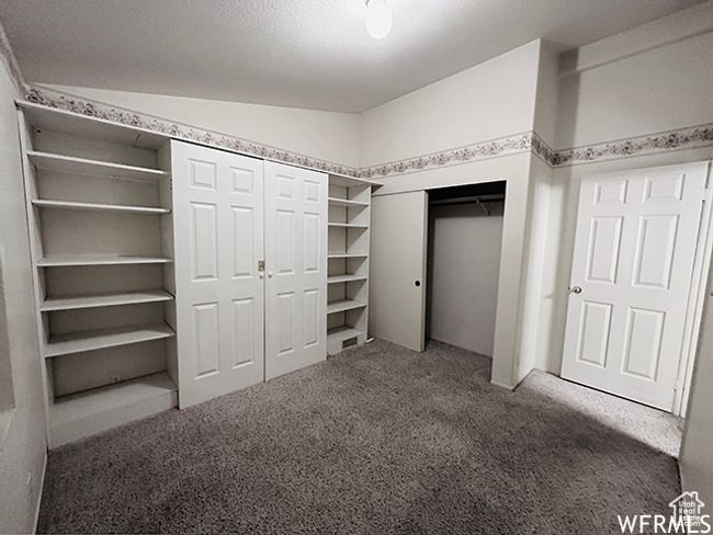 Unfurnished bedroom featuring carpet flooring | Image 22