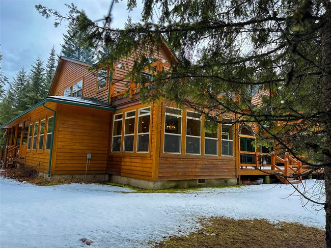 View of snow covered exterior with crawl space | Image 25