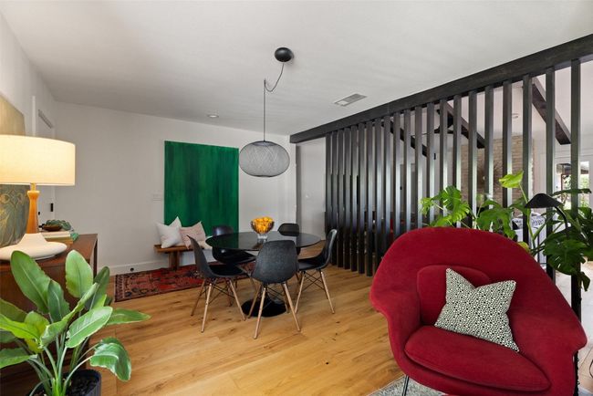 Custom slat wall added to open the space, while keeping it defined. | Image 4