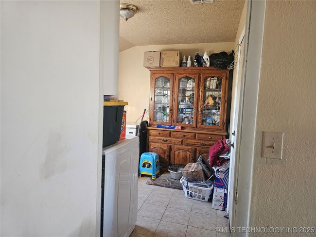 spacious utility room for comfort laundry or storage | Image 5