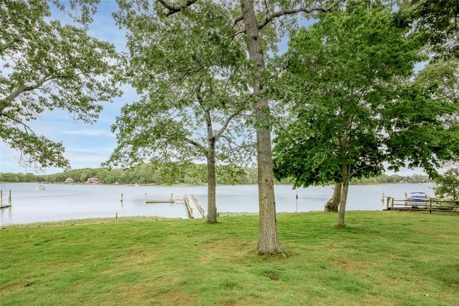 View of yard with a water view | Image 7