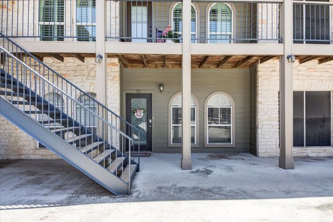 View of exterior entry with stone siding | Image 18