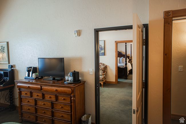 Bedroom with dark carpet | Image 25
