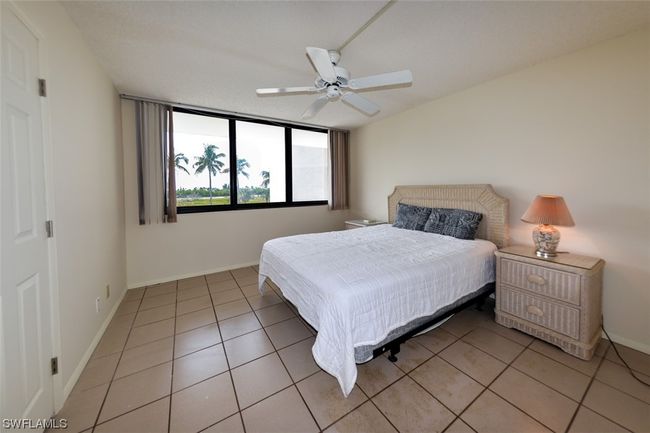 SPACIOUS GUEST BEDROOM WITH SOUTHERN EXPOSURE, IMPACT-RESISTANT WINDOWS. | Image 31