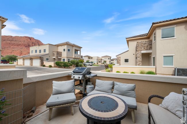 View of patio featuring a residential view, area for grilling, and red mountain view | Image 5