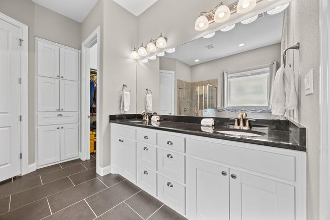 Double vanities, a soaking tub, and a separate shower give this ensuite bath the everyday luxury you’ve been craving | Image 20