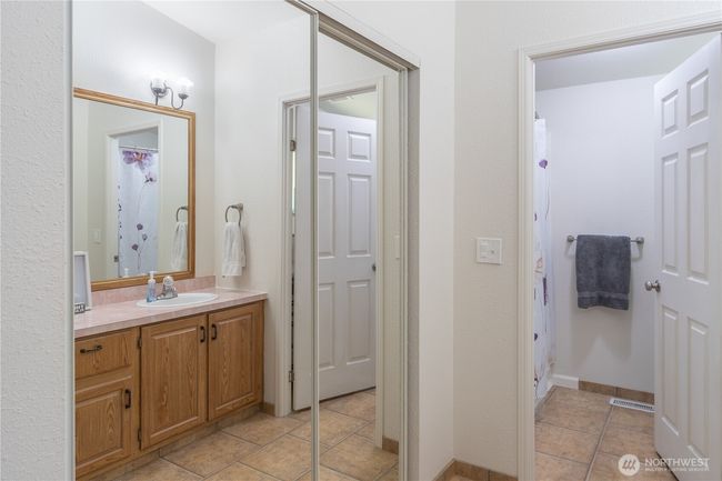 Here is another larger closet with mirror | Image 17