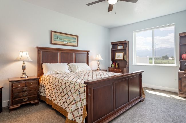 Generous main bedroom w/ceiling fan | Image 6