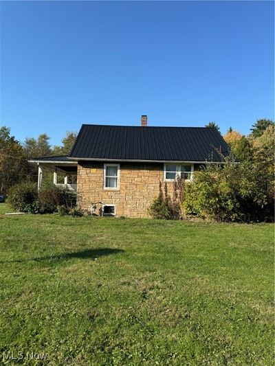 View of home's exterior featuring a lawn | Image 3