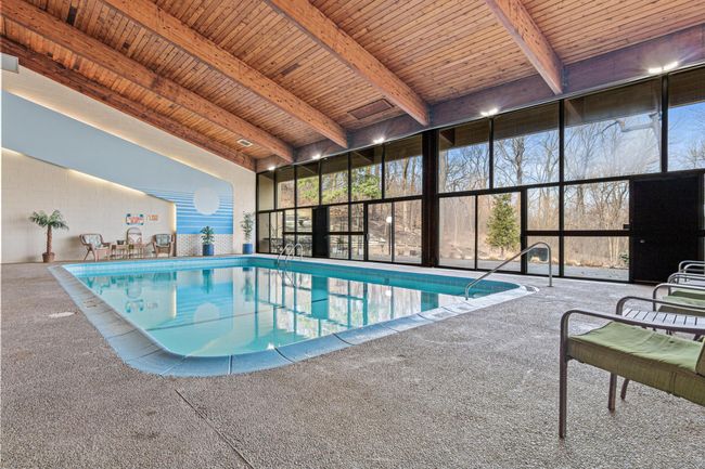 Pool with Adjacent Outdoor Patio & Seating Area | Image 29
