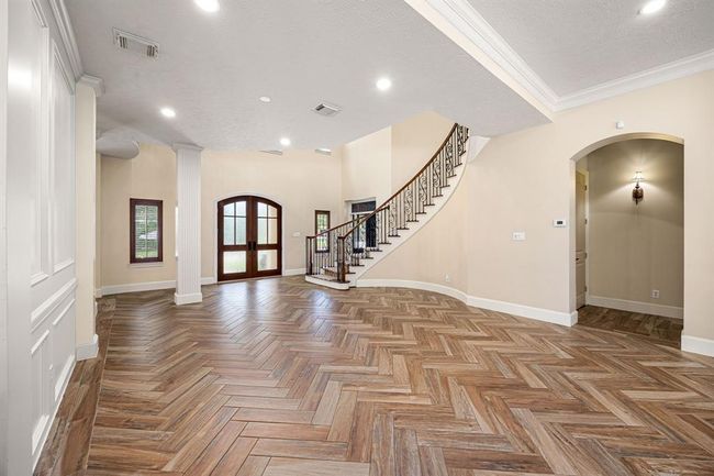 The main living space has plenty of opportunity to showcase your piano along with larger living room pieces. | Image 7
