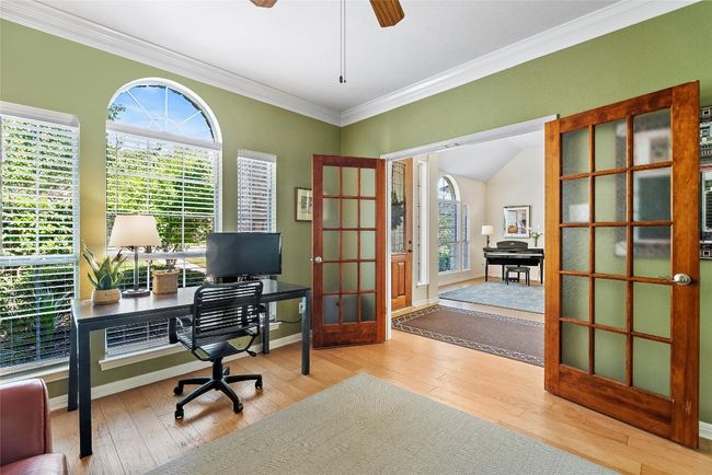 With ample space and flexibility, this room can easily be transformed into a fourth bedroom | Image 8
