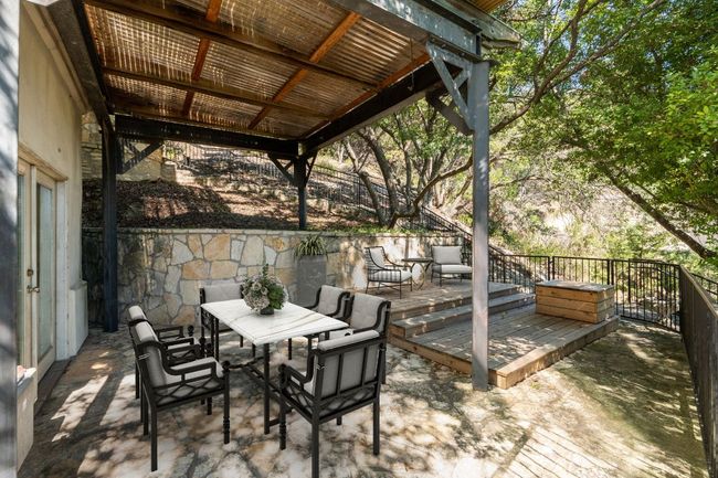 Wonderful Patio area out side of downstairs room. | Image 24