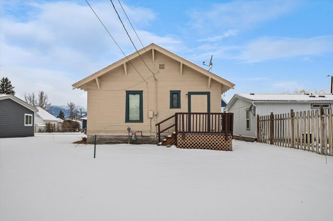 View of snow covered rear of property | Image 24