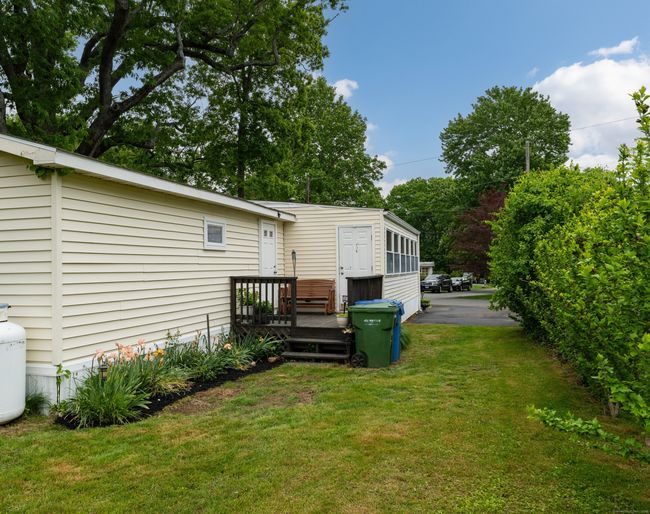 Summer Blooming Rose of Sharon line the property line | Image 23