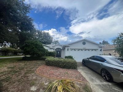 1009 Forest Breeze Path, House other with 3 bedrooms, 2 bathrooms and null parking in Leesburg FL | Image 1