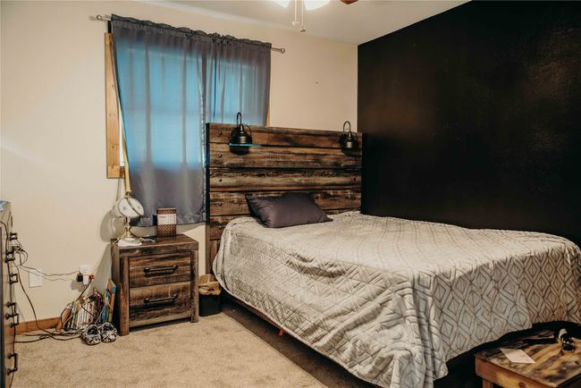 Bedroom with carpet flooring | Image 22