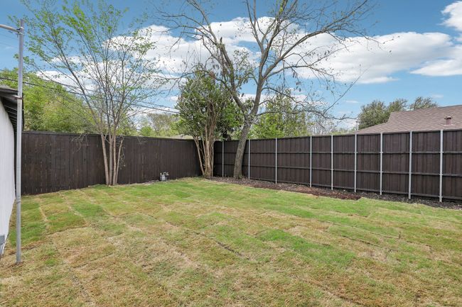 View of yard featuring a fenced backyard | Image 30
