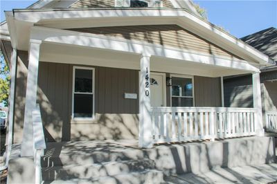 View of exterior entry featuring covered porch | Image 2