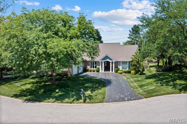 View of front of house with driveway and a front yard | Image 68