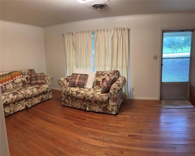 Living room with hardwood flooring | Image 2