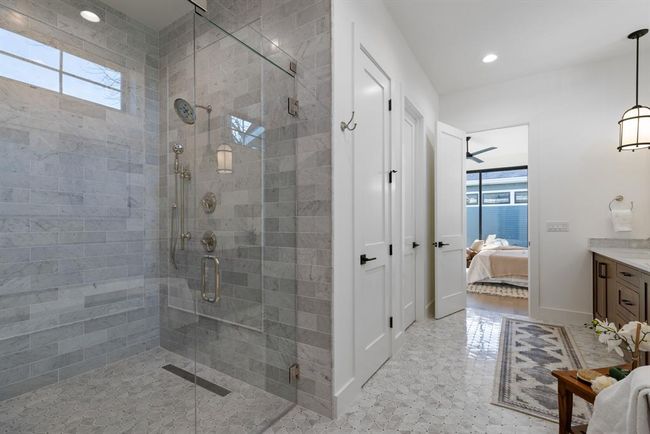 Full bathroom with ensuite bathroom, vanity, a shower stall, and recessed lighting | Image 12