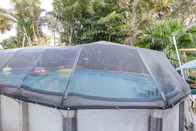 576 Sw Rustic Cir, House other with 3 bedrooms, 2 bathrooms and null parking in Stuart FL | Image 41