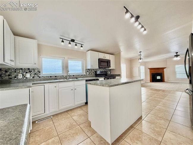 5410 Whipshaw Rd, House other with 3 bedrooms, 2 bathrooms and 3 parking in Peyton CO | Image 7