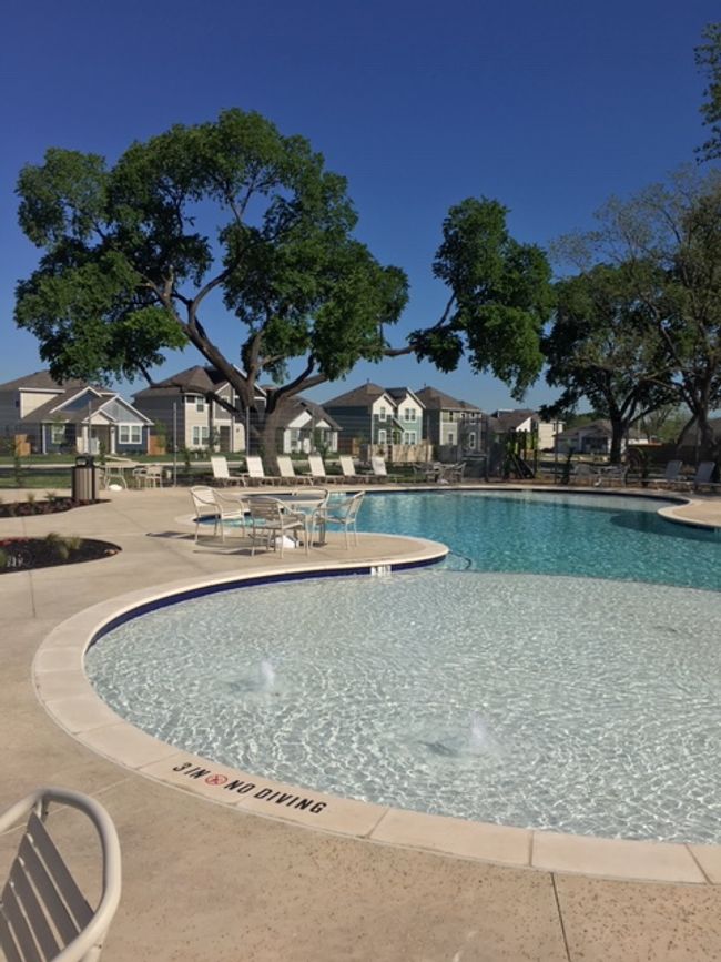 Pool with a patio and a residential view | Image 33
