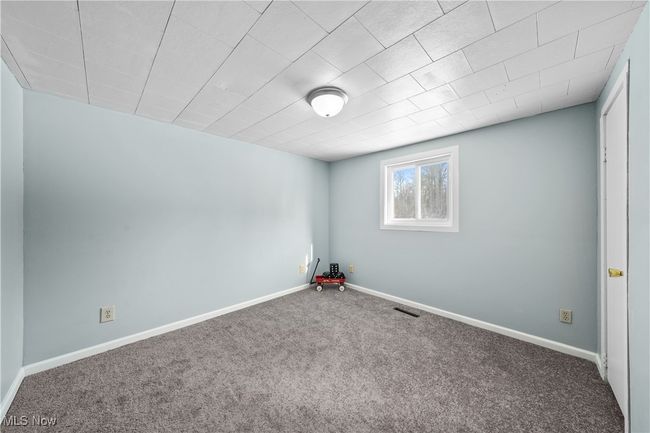 Bedroom with carpet | Image 12