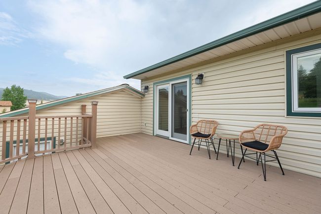 Deck featuring a mountain view | Image 28