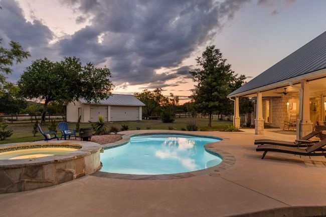 Whether for swimming or lounging, the pool area is perfect for entertaining or enjoying quiet moments by the water. | Image 34