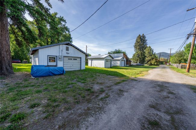 Detached garage with driveway | Image 36