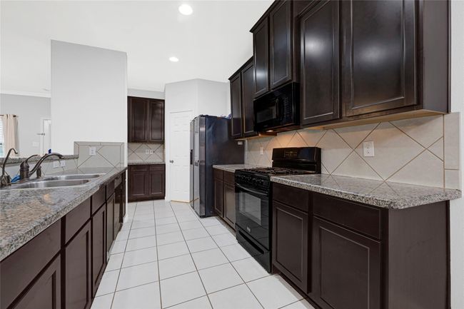 9002 Saint Laurent Ln, House other with 3 bedrooms, 2 bathrooms and 2 parking in Houston TX | Image 12