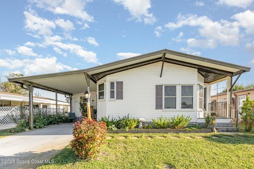 909 Dogwood Dr, Barefoot Bay, FL, 32976-7123 | Card Image