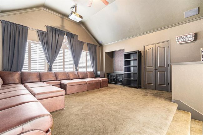 Tucked behind the half wall is a bar area that is ideal for snacks, so we can keep the heading downstairs to the kitchen to a minimum during our Netflix binge. | Image 28