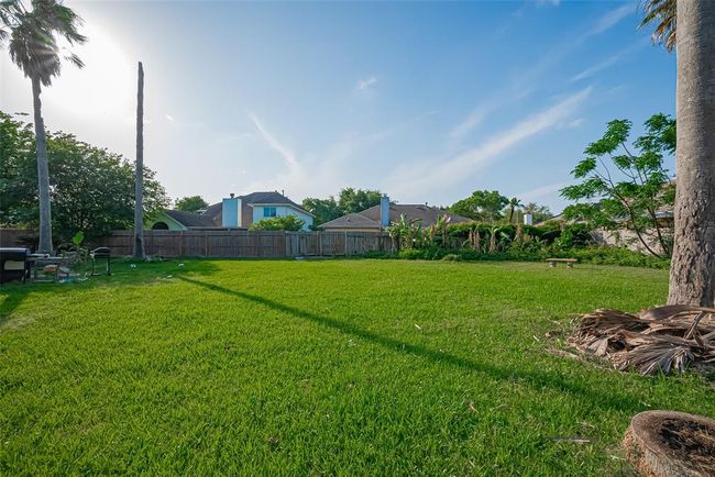 The backyard is a blank canvass for the next owner | Image 7