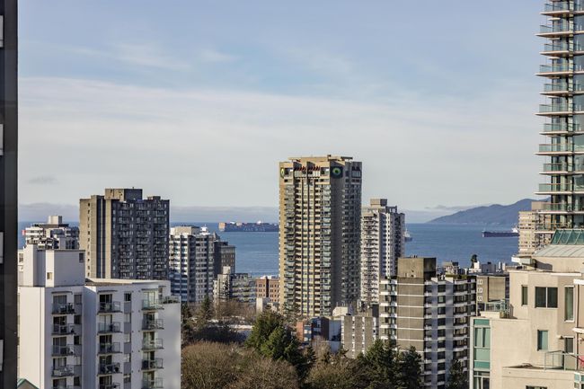 City view featuring a water and mountain view | Image 15