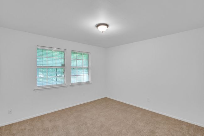 Unfurnished room featuring carpet floors and baseboards | Image 20