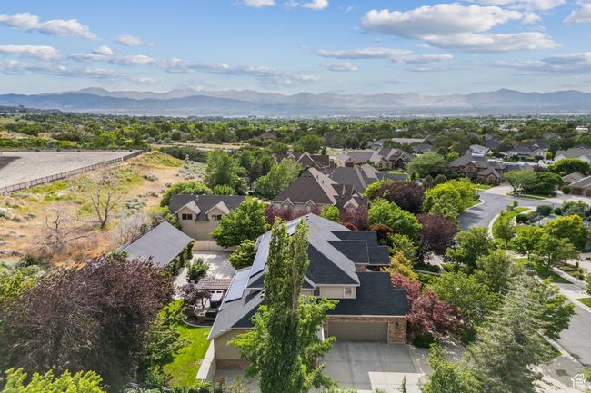 Aerial view of residential area with mountains | Image 82